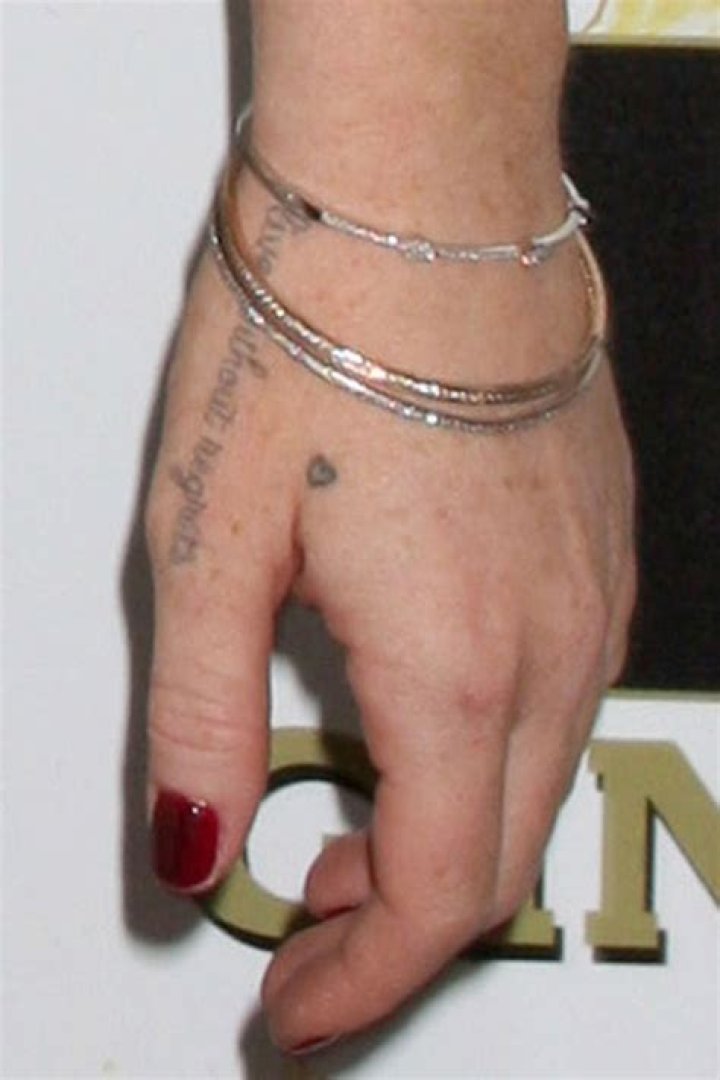 Alyson Hannigan: Husband, net worth, tattoos, smoking & body measurements