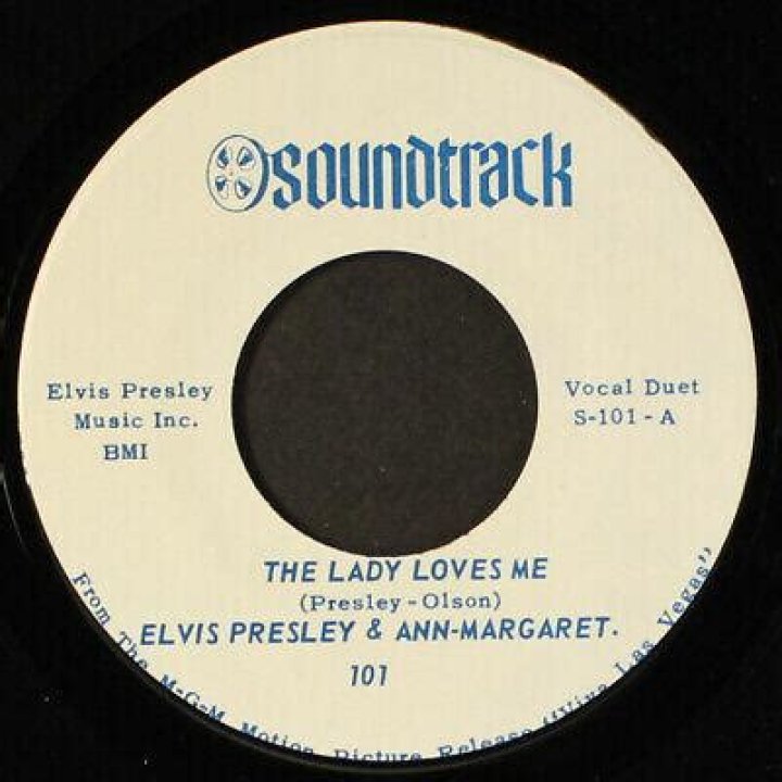 Elvis Presley’s
The Lady Loves Me Lyrics