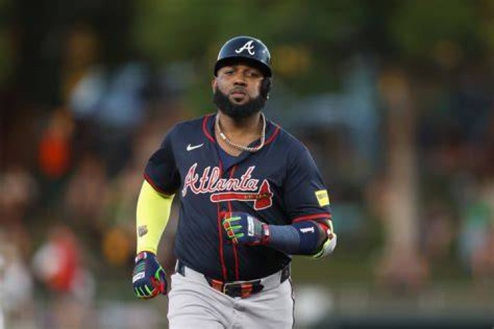 What number is Marcell Ozuna? How many hits does Marcell Ozuna have?